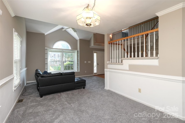 9315 Pebble Creek Way, Charlotte, NC 28269 - living area with carpet, baseboards, lofted ceiling, a chandelier, and ceiling fan