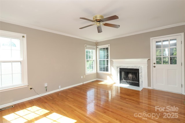 9315 Pebble Creek Way, Charlotte, NC 28269 - unfurnished living room featuring light wood-type flooring, healthy amount of natural light, baseboards, a ceiling fan, and ornamental molding