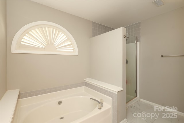 9315 Pebble Creek Way, Charlotte, NC 28269 - bathroom featuring a shower stall, a garden tub, and marble finish flooring