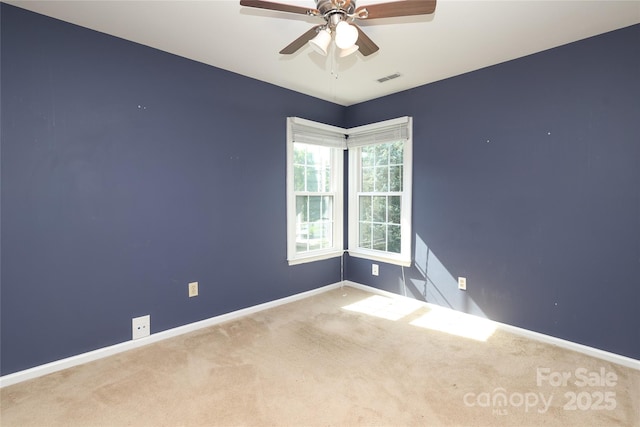 9315 Pebble Creek Way, Charlotte, NC 28269 - spare room featuring carpet flooring, baseboards, and a ceiling fan