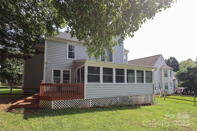 9315 Pebble Creek Way, Charlotte, NC 28269 - rear view of house featuring a sunroom and a deck