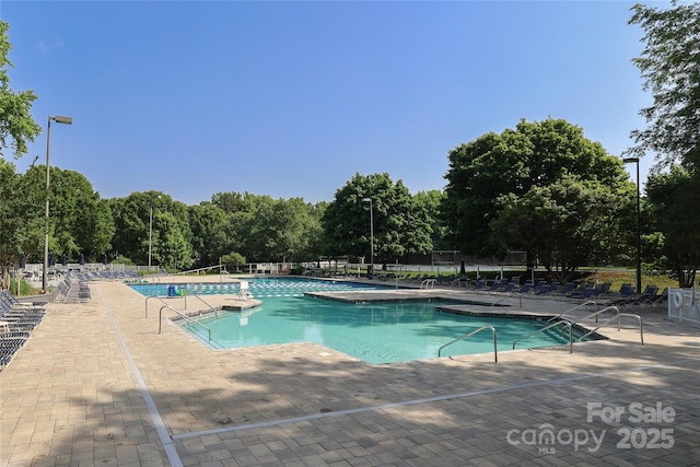 9315 Pebble Creek Way, Charlotte, NC 28269 - community pool with a patio area and fence