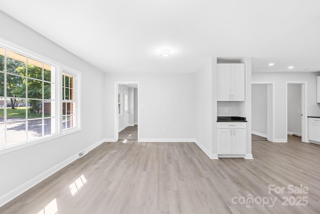 1408 Delview Rd, Cherryville, NC 28021 - unfurnished living room featuring light wood-style flooring and recessed lighting