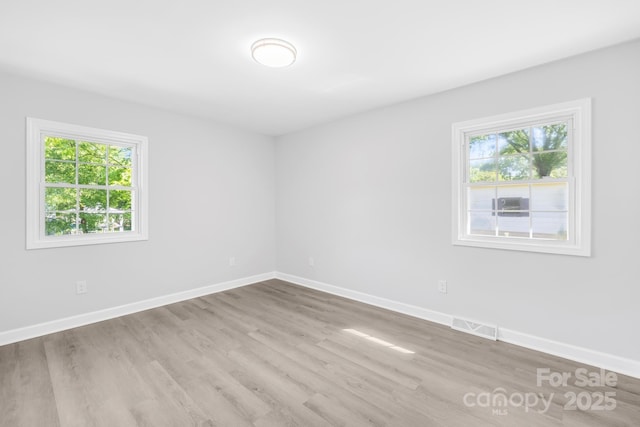 1408 Delview Rd, Cherryville, NC 28021 - spare room featuring wood finished floors and baseboards