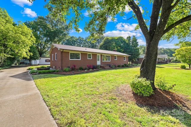 1408 Delview Rd, Cherryville, NC 28021 - ranch-style home with brick siding, a front yard, and entry steps