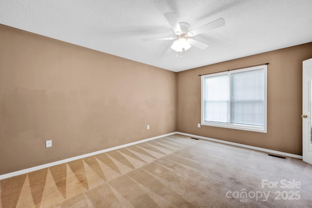 5678 Cedar Run Dr, Denver, NC 28037 - carpeted empty room featuring baseboards, a ceiling fan, and a textured ceiling