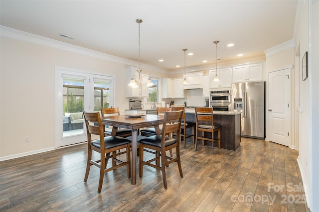 2014 Drawbridge Dr, Fort Mill, SC 29707 - dining room with dark wood-style flooring, crown molding, baseboards, a chandelier, and recessed lighting