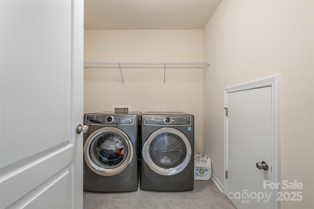 2014 Drawbridge Dr, Fort Mill, SC 29707 - clothes washing area with washer and dryer and tile patterned flooring