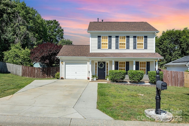 197 Devon Forest Dr, Mooresville, NC 28115 - traditional-style house featuring a garage, covered porch, concrete driveway, and roof with shingles