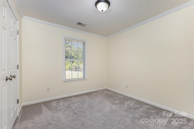 197 Devon Forest Dr, Mooresville, NC 28115 - carpeted empty room featuring ornamental molding, a textured ceiling, and baseboards