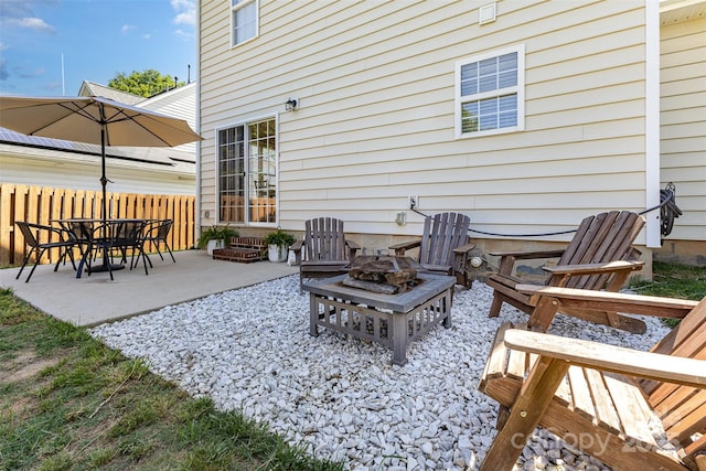 197 Devon Forest Dr, Mooresville, NC 28115 - view of patio featuring an outdoor fire pit and fence