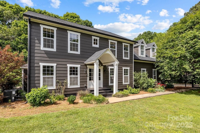 5229 Mt Holly Huntersville Rd, Charlotte, NC 28216 - colonial inspired home featuring a front lawn and central AC