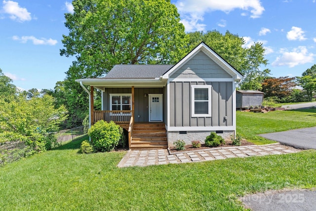 7 Lola Lilly Pl, Asheville, NC 28803 - bungalow-style home with board and batten siding, crawl space, and a porch