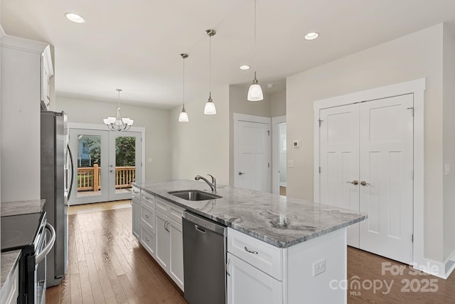 7 Lola Lilly Pl, Asheville, NC 28803 - kitchen with a sink, stainless steel appliances, dark wood-style floors, an island with sink, and recessed lighting