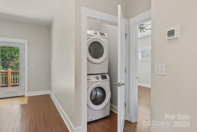 7 Lola Lilly Pl, Asheville, NC 28803 - washroom with stacked washer / drying machine, a ceiling fan, wood finished floors, and baseboards