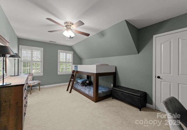 328 Whippoorwill Rd, Mooresville, NC 28117 - bedroom with light colored carpet, baseboards, vaulted ceiling, and ceiling fan