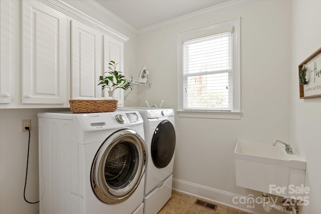 7507 Meadowgate Ln, Waxhaw, NC 28173 - laundry room featuring washing machine and clothes dryer, cabinet space, baseboards, and ornamental molding
