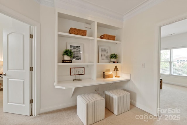 7507 Meadowgate Ln, Waxhaw, NC 28173 - living area featuring carpet floors, ornamental molding, built in features, and baseboards