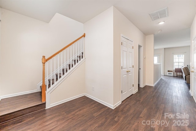 13612 Singleleaf Ln, Charlotte, NC 28278 - hall featuring wood finished floors, baseboards, and stairway