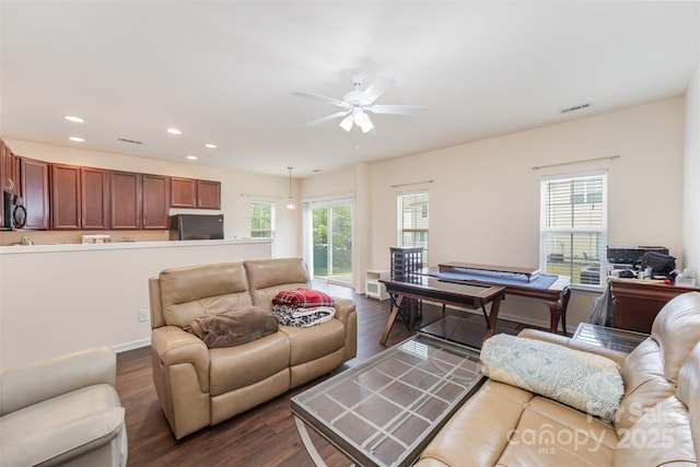 13612 Singleleaf Ln, Charlotte, NC 28278 - living area featuring dark wood-type flooring, a ceiling fan, and recessed lighting