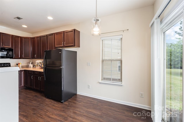 13612 Singleleaf Ln, Charlotte, NC 28278 - kitchen featuring black appliances, plenty of natural light, dark wood finished floors, light countertops, and recessed lighting
