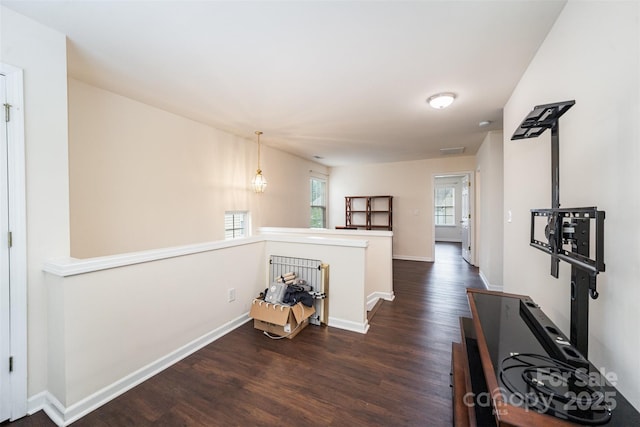 13612 Singleleaf Ln, Charlotte, NC 28278 - hallway featuring wood finished floors, an upstairs landing, and baseboards