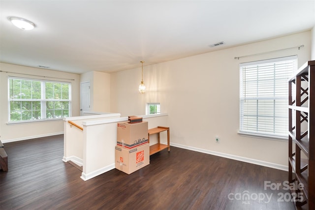 13612 Singleleaf Ln, Charlotte, NC 28278 - kitchen with dark wood finished floors, baseboards, and plenty of natural light