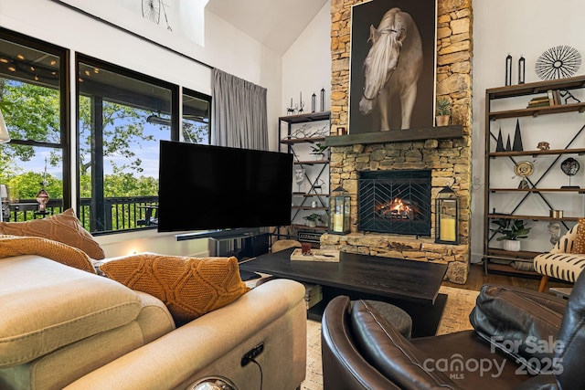 5 Saddle Rdg, Fletcher, NC 28732 - living area featuring a stone fireplace and high vaulted ceiling