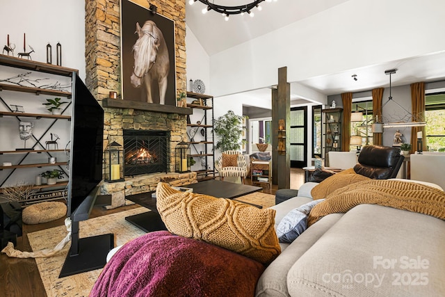 5 Saddle Rdg, Fletcher, NC 28732 - living area featuring wood finished floors, a fireplace, and high vaulted ceiling