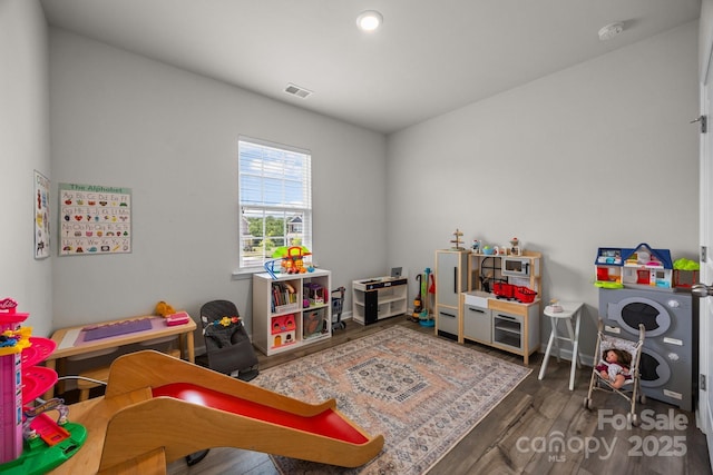 playroom featuring wood finished floors