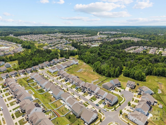 aerial overview of property's location with nearby suburban area