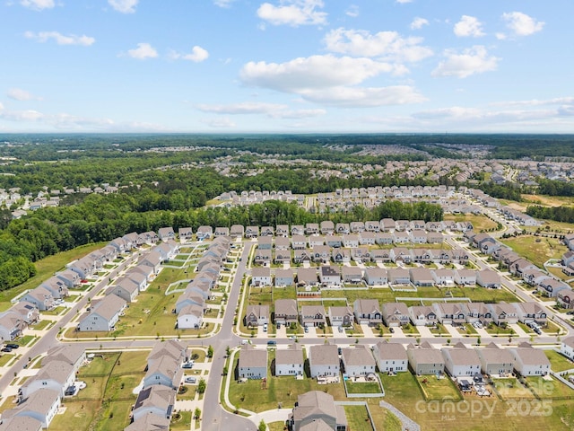 aerial overview of property's location featuring nearby suburban area