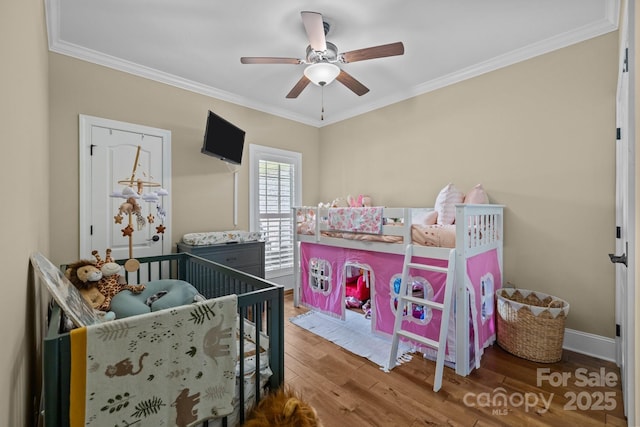 335 Wintergreen Ct, Kings Mountain, NC 28086 - bedroom with crown molding, wood finished floors, a ceiling fan, and baseboards