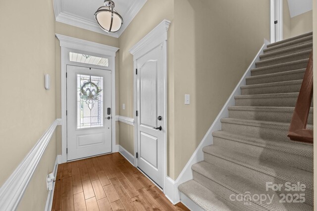 335 Wintergreen Ct, Kings Mountain, NC 28086 - entryway with stairs, wood finished floors, and ornamental molding