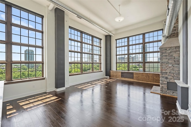 unfurnished sunroom featuring plenty of natural light