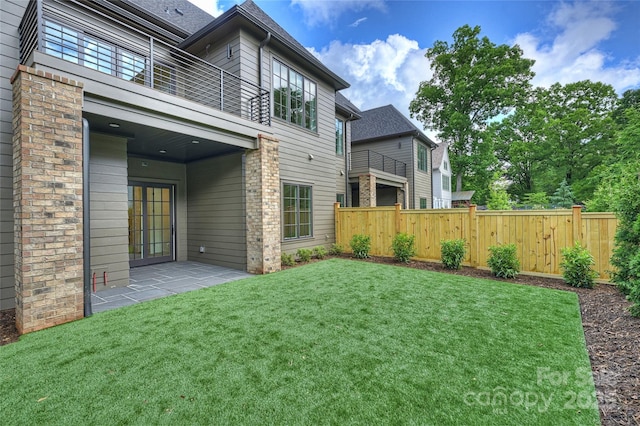 536 Hillside Ave, Charlotte, NC 28209 - view of yard featuring a balcony and a patio