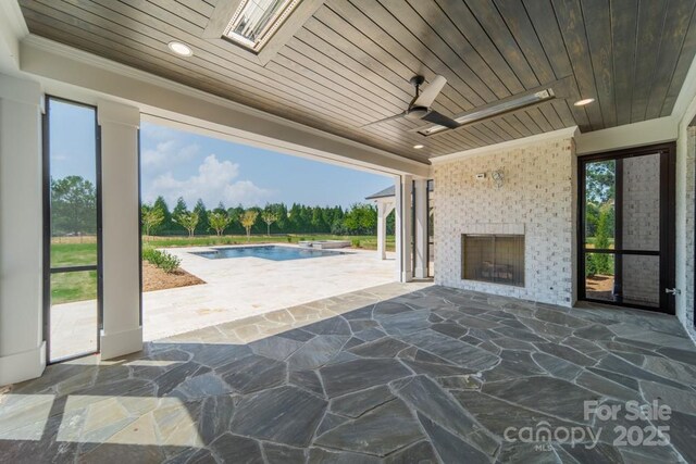306 Sugar Maple Ln, Weddington, NC 28104 - view of patio / terrace featuring an outdoor brick fireplace, ceiling fan, and an outdoor pool
