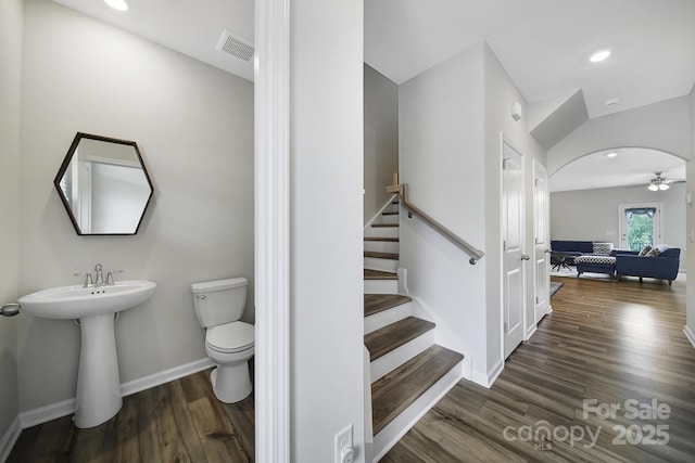 5034 Moss Pine Way, Tega Cay, SC 29708 - bathroom featuring wood finished floors, toilet, baseboards, recessed lighting, and a sink