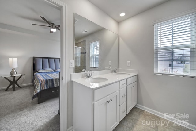 5034 Moss Pine Way, Tega Cay, SC 29708 - ensuite bathroom with healthy amount of natural light, a shower with door, ceiling fan, and baseboards