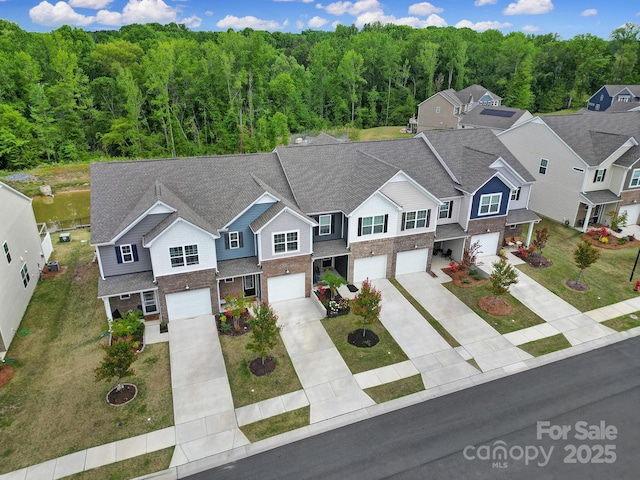 5034 Moss Pine Way, Tega Cay, SC 29708 - aerial perspective of suburban area with a heavily wooded area