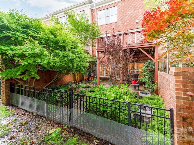 3044 Luke Crossing Dr, Charlotte, NC 28226 - rear view of property with brick siding and a balcony