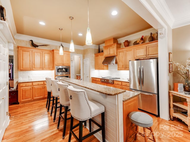 3044 Luke Crossing Dr, Charlotte, NC 28226 - kitchen featuring appliances with stainless steel finishes, crown molding, tasteful backsplash, a breakfast bar, and a center island