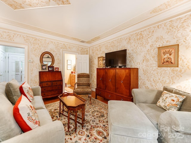 3044 Luke Crossing Dr, Charlotte, NC 28226 - living area featuring wood finished floors, wallpapered walls, crown molding, and baseboards