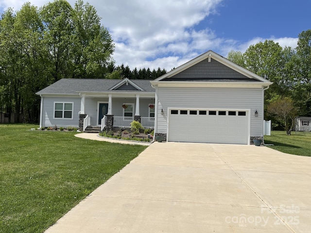 1119 Balls Creek Rd, Claremont, NC 28610 - craftsman inspired home featuring a porch, concrete driveway, an attached garage, and a front lawn