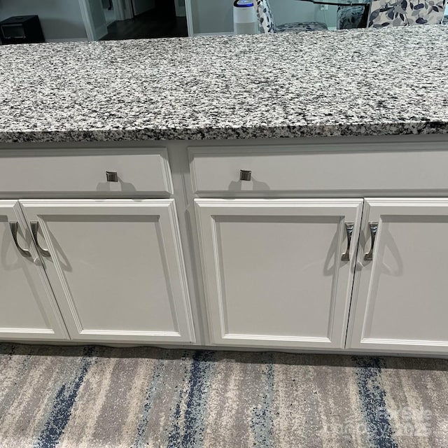 1119 Balls Creek Rd, Claremont, NC 28610 - detailed view of white cabinets and stone countertops