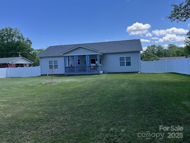 1119 Balls Creek Rd, Claremont, NC 28610 - rear view of house with a deck and roof with shingles