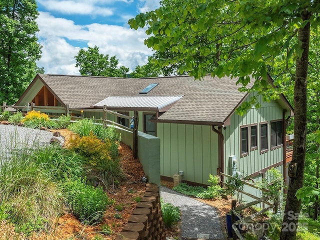 201 Ruffed Grouse Ln, Waynesville, NC 28786 - view of front of home with a shingled roof and board and batten siding