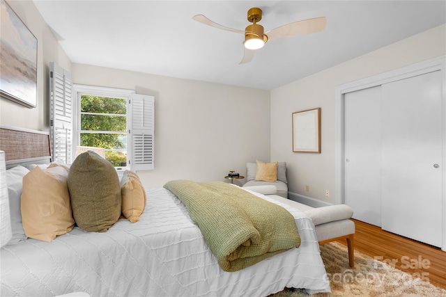 5162 Lincrest Pl, Charlotte, NC 28211 - bedroom featuring wood finished floors, a closet, and ceiling fan