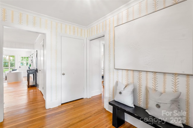 5162 Lincrest Pl, Charlotte, NC 28211 - hall with light wood finished floors, crown molding, and wallpapered walls