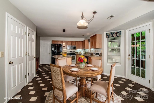 292 Rose St, Mooresville, NC 28117 - dining area with dark flooring and baseboards